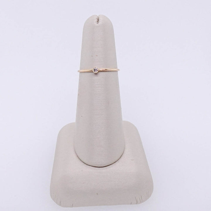 Thin Ring with Bezel Diamond