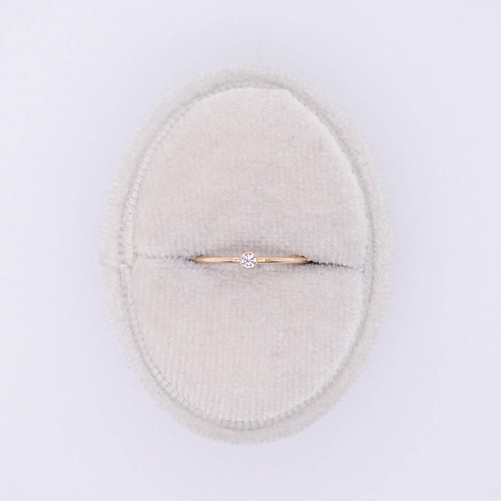 Thin Ring with Bezel Diamond