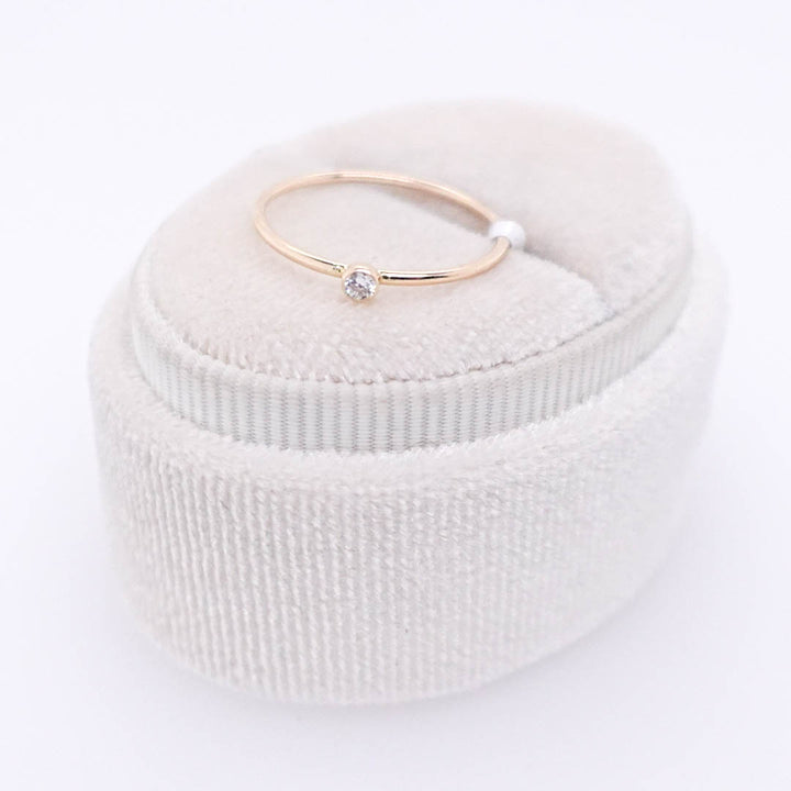 Thin Ring with Bezel Diamond