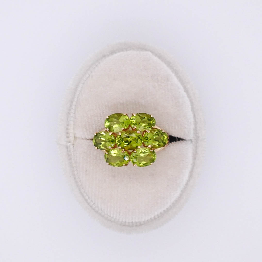 Seven Oval Peridot Dinner Ring